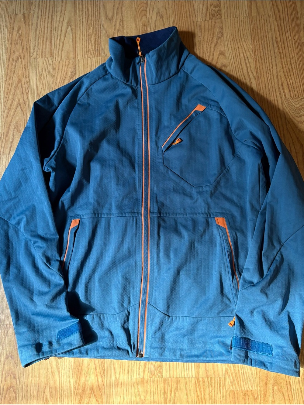 REI Blue Performance Jacket with Orange Accents